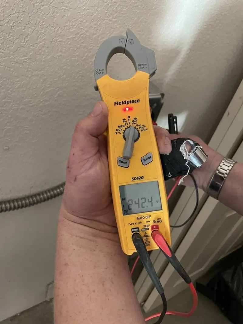 Voltage testing with clamp meter during Hot Tub / Pool Electrical Wiring in Fort Riley